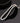 Детайлен изглед на колие от овални сладководни перли с фин седефен отблясък и класическа дизайн