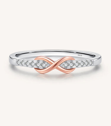 Сребърен пръстен със знак на безкрайност с Rose Gold покритие и бели циркони