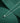 Сребърна верижка с малко гладко сърце, поставена върху зелена повърхност