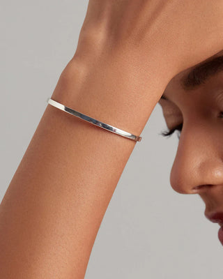 Silver bracelet with heart pendant, snake chain and white cubic zircon