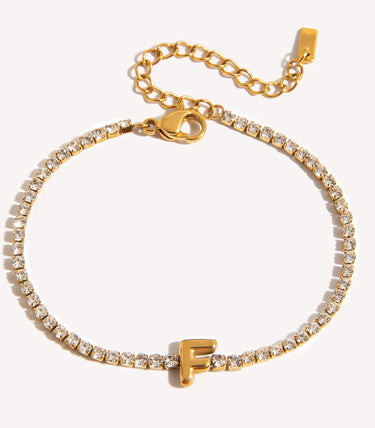 Гривна с буква F и циркони