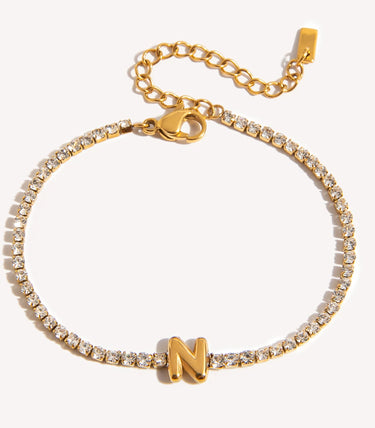 Гривна с буква N и циркони