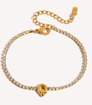 Гривна с буква Q и циркони