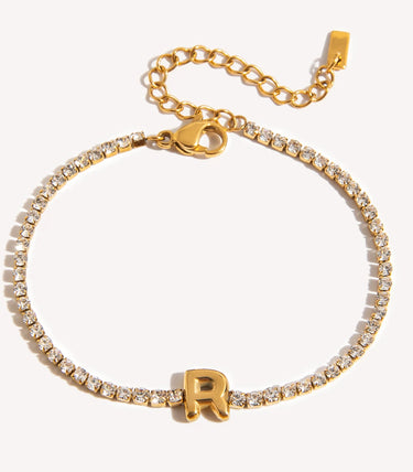 Гривна с буква R и циркони