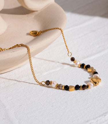 Гривна с хематит перли и сърца