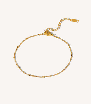 Гривна за глезен с елементи топченца