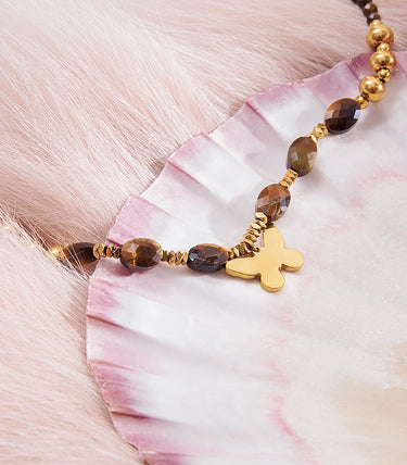 Колие с хематит и елемент пеперуда