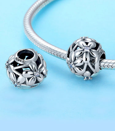 Сребърен талисман „Цветя на чистотата“