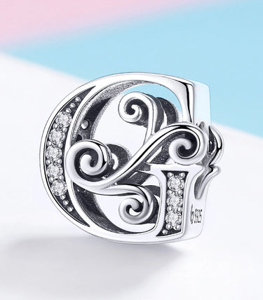 Сребърен талисман „G“