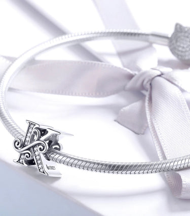 Сребърен талисман „K“