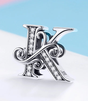 Сребърен талисман „K“