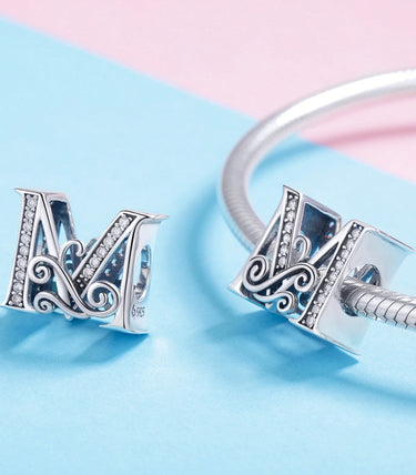 Сребърен талисман „M“