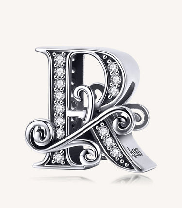 Сребърен талисман „R“