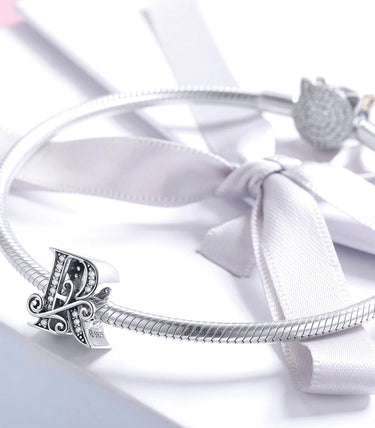 Сребърен талисман „R“