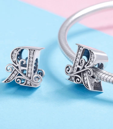 Сребърен талисман „R“