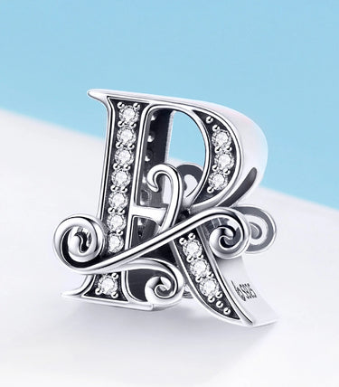 Сребърен талисман „R“