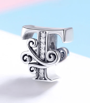 Сребърен талисман „T“