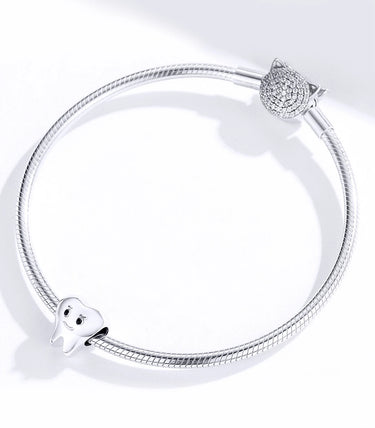 Сребърен талисман „Зъбчо“