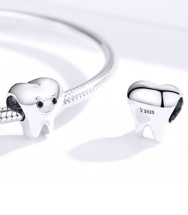 Сребърен талисман „Зъбчо“