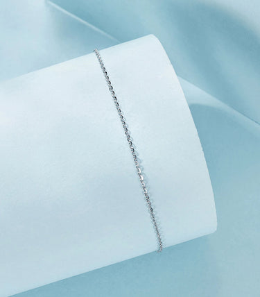 Сребърна гривна за крак „Дискретен лукс“