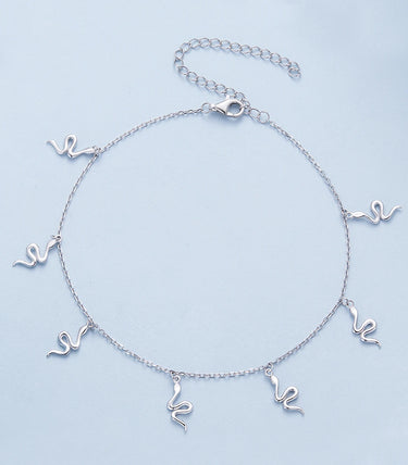 Сребърна гривна за крак „Изкусителка“