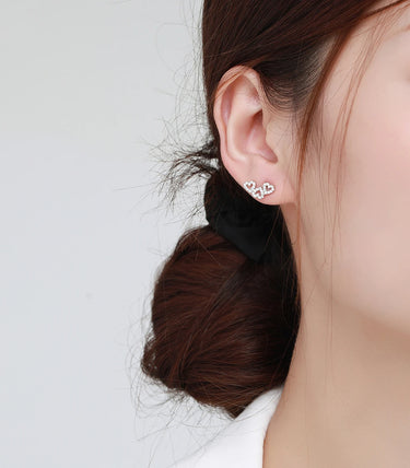 Сребърни обеци „Танцът на сърцата“