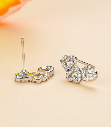 Сребърни обеци „Танцът на сърцата“