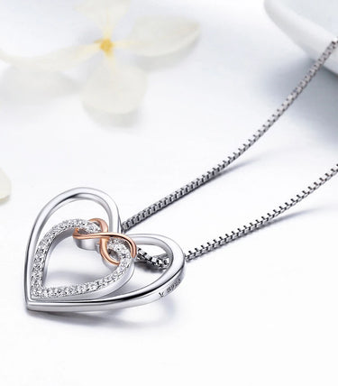Сребърно колие „Две сърца в едно“