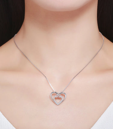 Сребърно колие „Две сърца в едно“