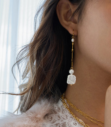 Висящи обеци с различни по форма перли